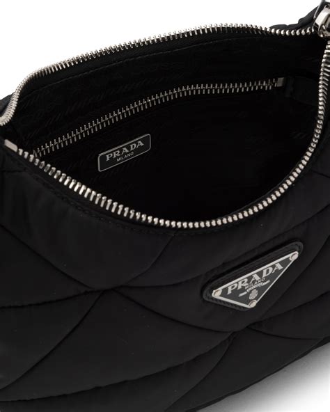 prada canvas shoulder bag|Prada padded nylon shoulder bag.